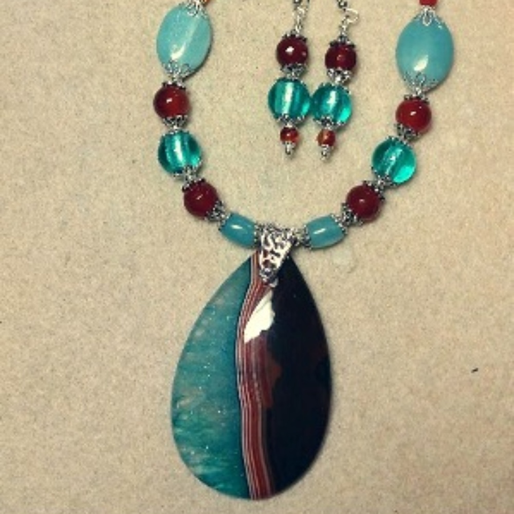 Pendant necklace and earring set,